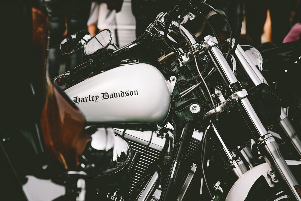 side picture of a silver Harley Davidson